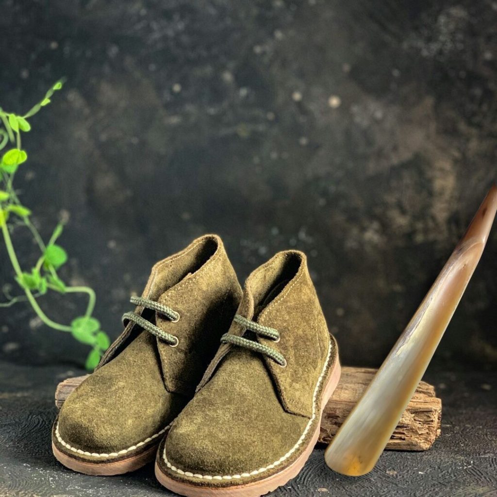 "Slip into your shoes with ease and keep them looking new with a durable shoehorn – the perfect tool for preserving your footwear’s shape and comfort."