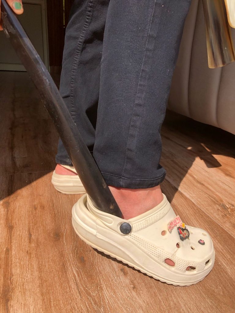 "Slip into your shoes with ease and keep them looking new with a durable shoehorn – the perfect tool for preserving your footwear’s shape and comfort."