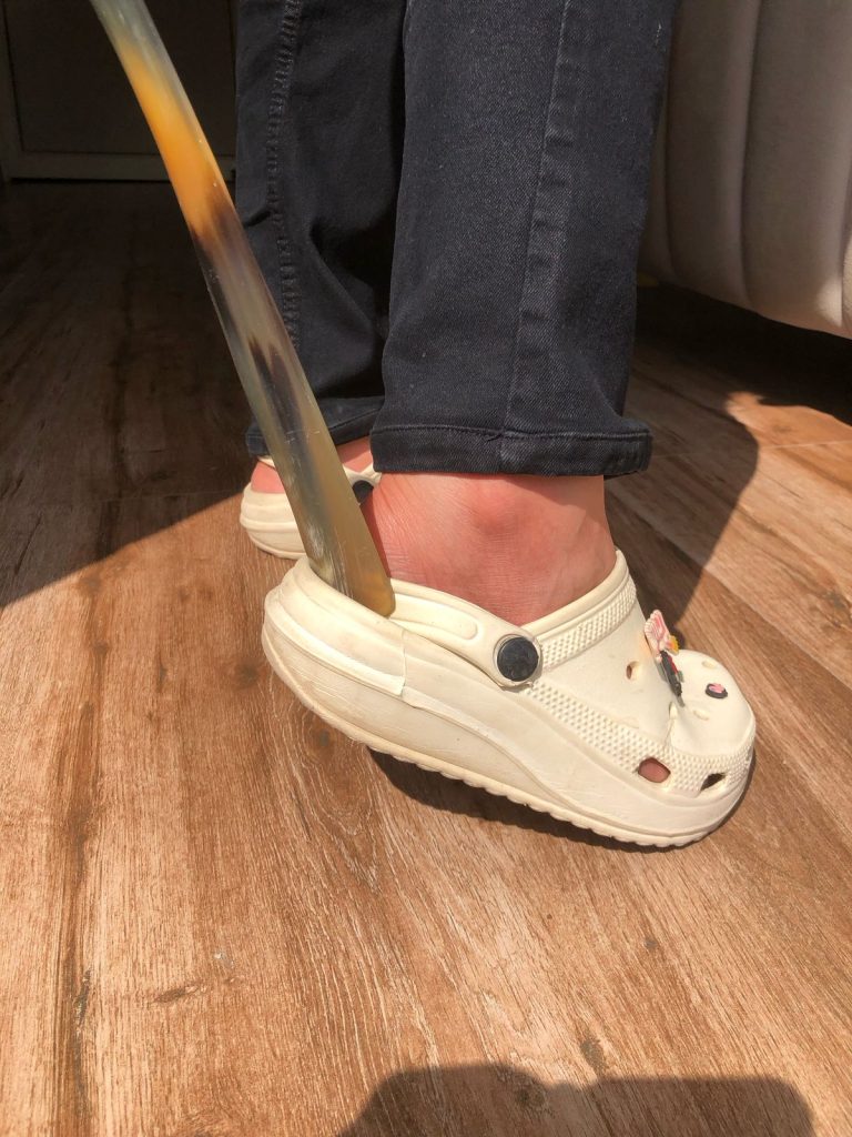 "Slip into your shoes with ease and keep them looking new with a durable shoehorn – the perfect tool for preserving your footwear’s shape and comfort."