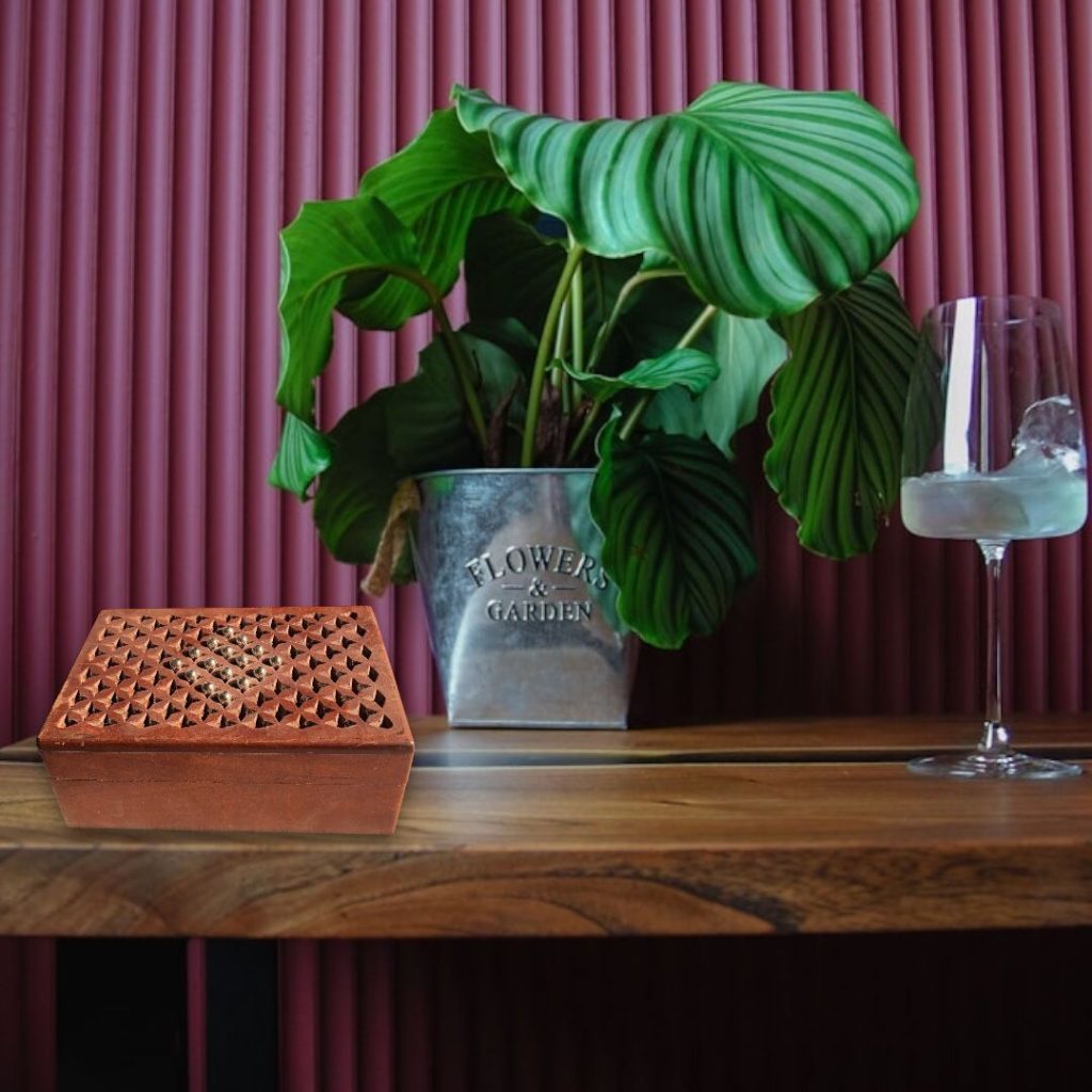 Add rustic charm and practical elegance to your space with our Wooden Box. Expertly crafted from high-quality wood, this versatile box offers a timeless design that blends seamlessly with both traditional and contemporary interiors. Perfect for storing small items or as a decorative accent, the wooden box is a must-have addition to your home or office.